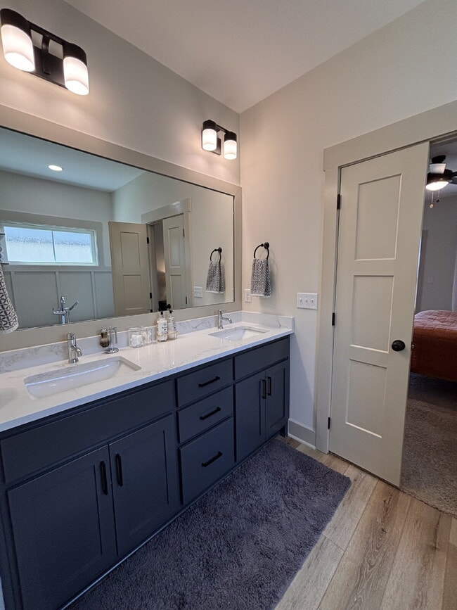 Building Photo - Need Space?  How about 5 bedrooms, 2.5 baths + an extra bonus area upstairs so that the kids can ...