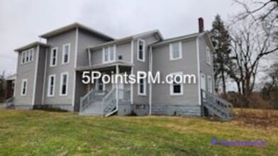 Building Photo - 9804 Miles Ave