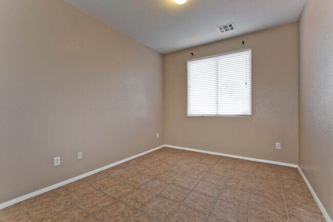 Building Photo - THIS 2 STORY HOME IN A GATED COMMUNITY HAS...