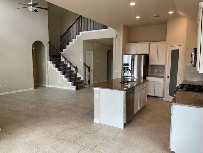 Building Photo - Move-In Ready! Stunning 1.5-Story Home wit...