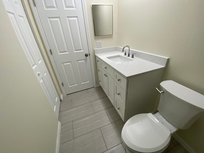 Building Photo - Clean two bedroom two bath with Office and porch