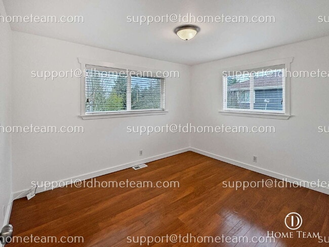 Building Photo - "Charming 4-Bed Family Home in SeaTac with Granite Countertops & Hardwood Floors!"