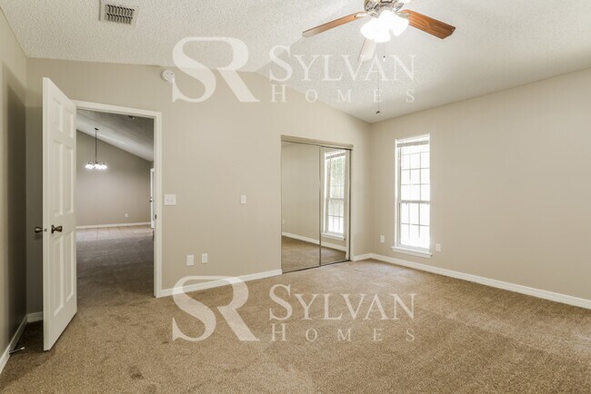 Building Photo - The living is easy in this 4 bedroom, 2 bathroom home