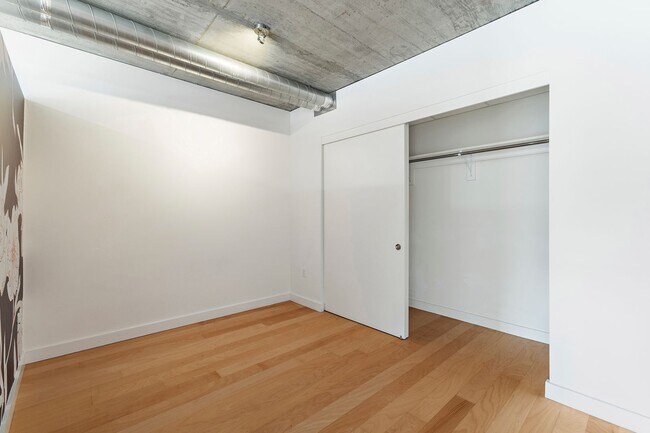 Building Photo - The Civic Condominiums - 8th floor west facing studio w/parking/ most utilities/concierge/views (...