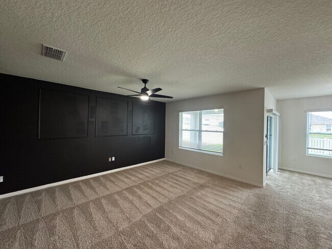Building Photo - 3BD/2BA Modern Florida Home Living Reimagined — Solar-Powered Elegance Near I-95 in Edgewater! FU...