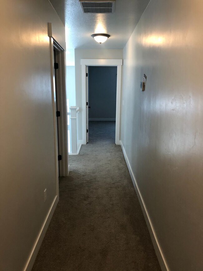 Building Photo - AMAZING HOME IN SOUGHT AFTER EXCHANGE DEVELOPMENT W/ 2 CAR GARAGE