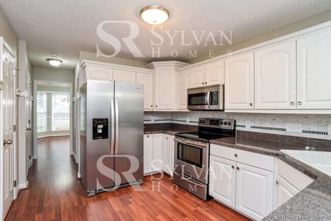 Building Photo - This gorgeous home is move-in ready for new residents!