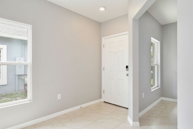 Building Photo - Move-In Ready 2BR/2BA Villa with Den + 2-Car Garage | Lake Nona Adjacent | Suncrest at St. Cloud
