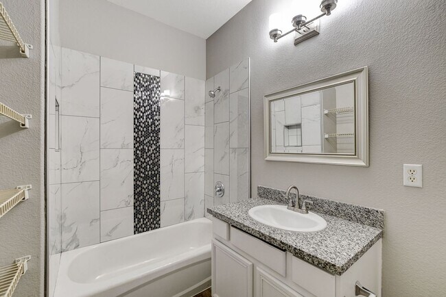 Building Photo - Upgrated upstairs 2 Bedrm 2 bath Gated Com...
