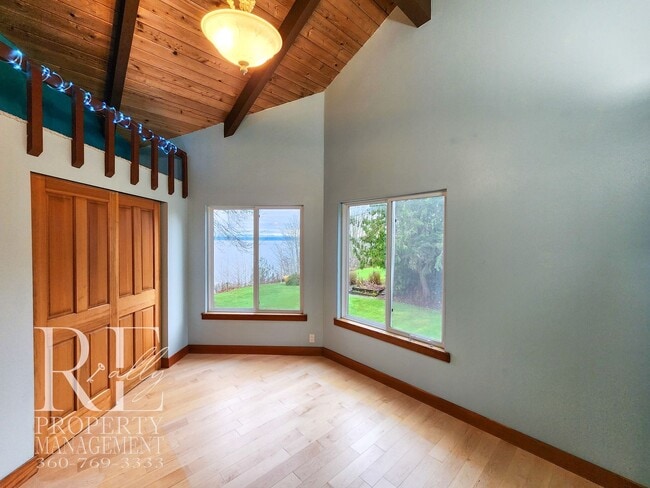 Building Photo - MOVE-IN SPECIAL: 50% OFF FIRST MONTHS RENT - Waterfront Rustic Retreat with Vaulted Ceilings, Pic...