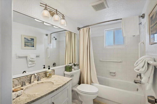 Building Photo - 6154 Midnight Pass Rd