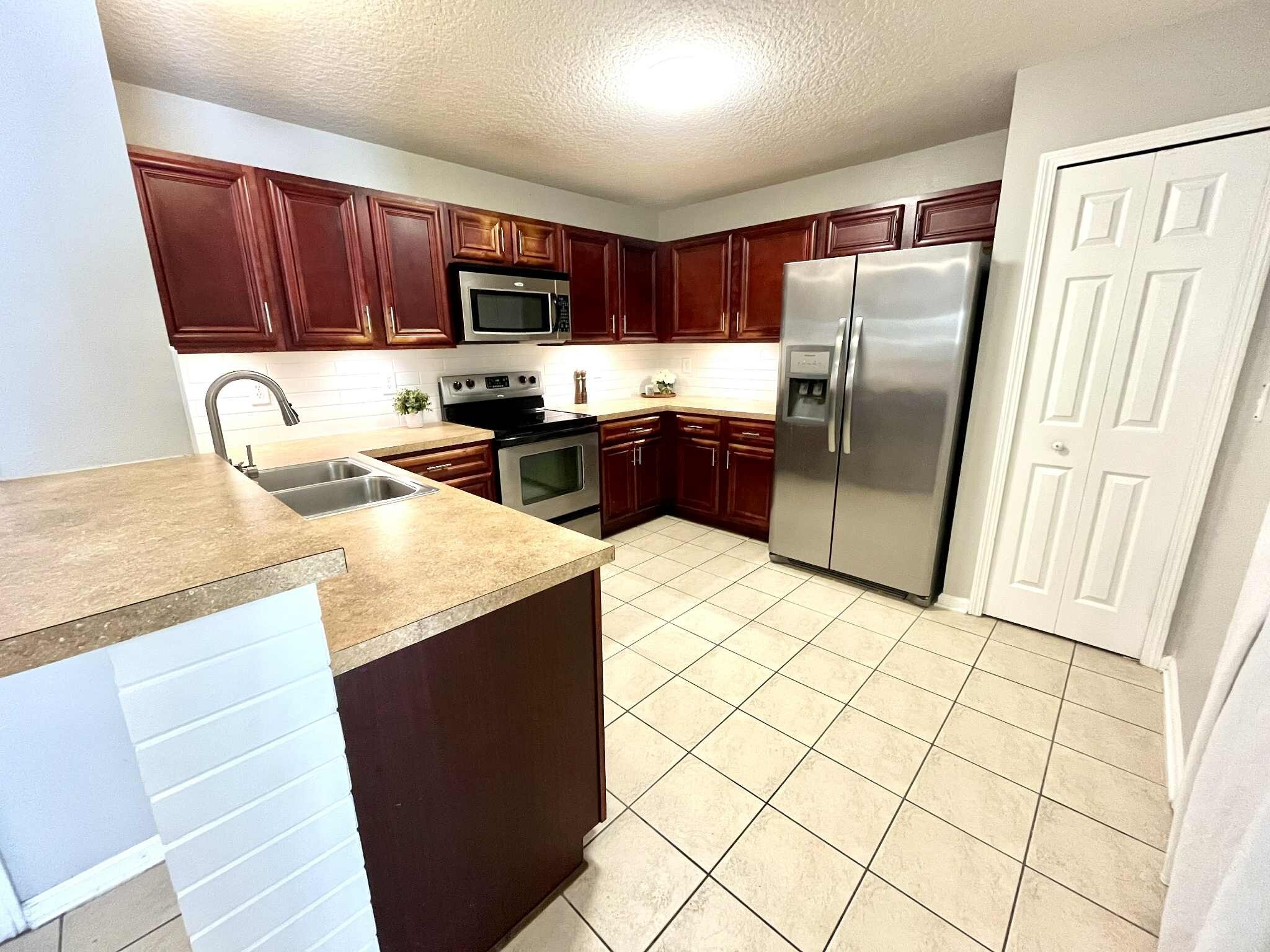 Kitchen with stainless steel appliances - 2780 Golden Lake Loop