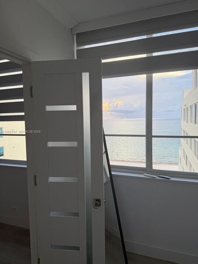 Building Photo - 5005 Collins Ave