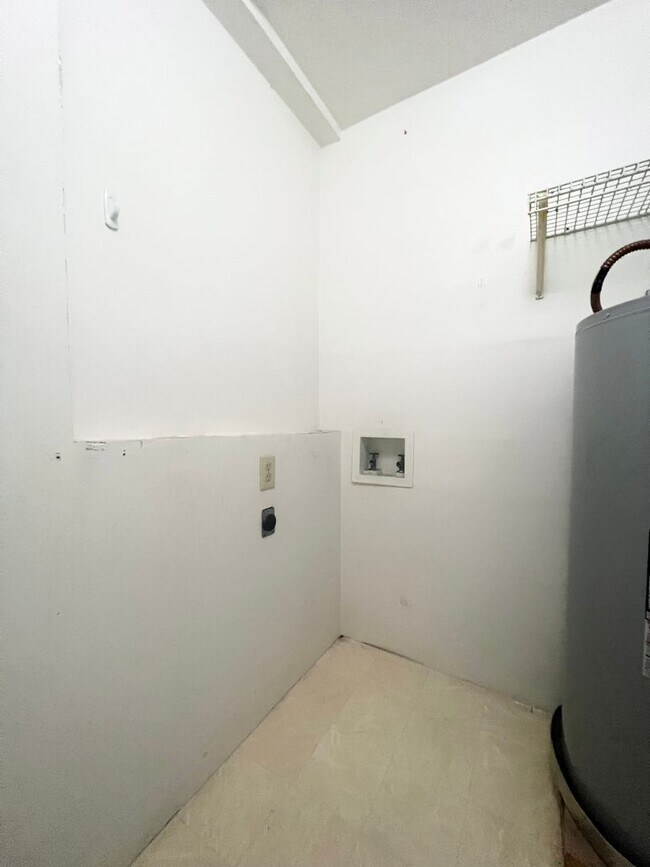 Building Photo - COMING APRIL 2026 - Affordable 2-Bedroom 1.5-Bathroom Home w/ Carport Parking!