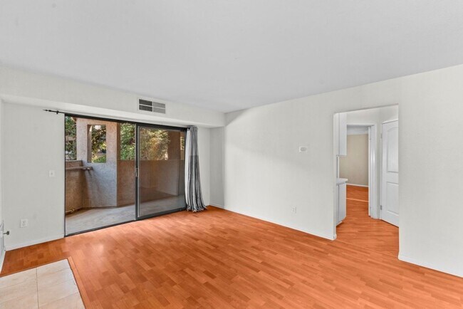 Building Photo - Stylish 1-Bed Condo with Balcony, Garage & Resort-Style Amenities in Mira Mesa