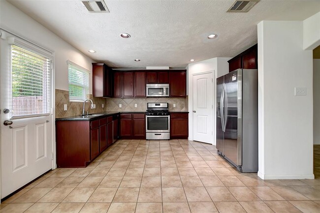 Building Photo - 11842 Red Hummingbird Dr