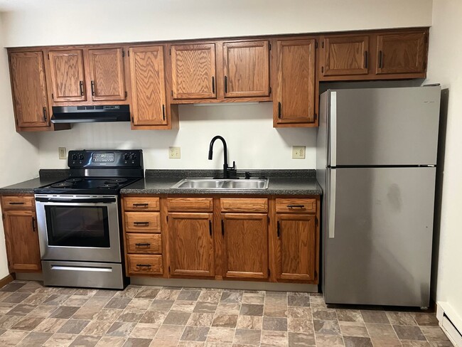 Building Photo - Spacious 2-Bedroom Living in a Quiet Commu...