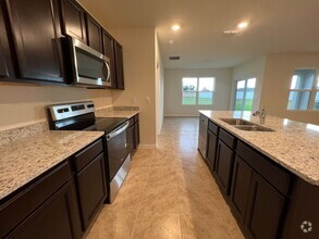 Building Photo - BRAND NEW CONSTRUCTION!! Avalon Park Commu...