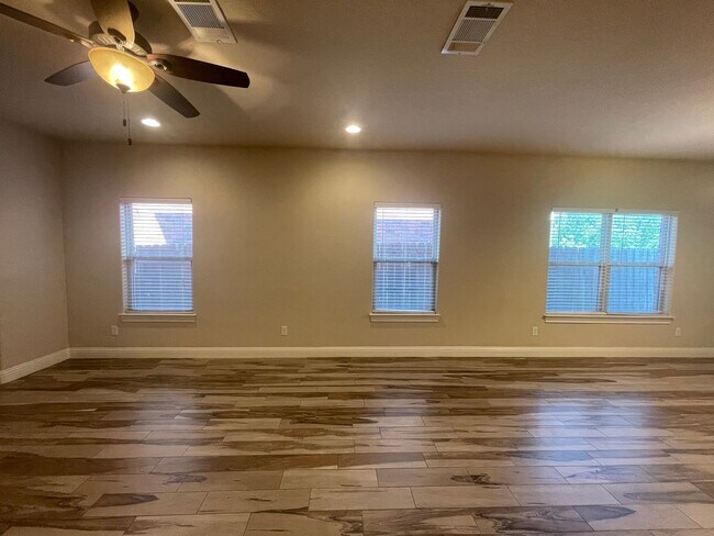 Building Photo - Beautiful Benbrook 3B/2.5B Townhome ((Stainless Steel Appliance Package)) Dazzling wood-like tile...
