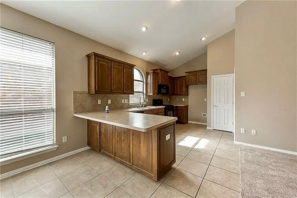 Kitchen/barstool area - 2716 Twinflower Dr