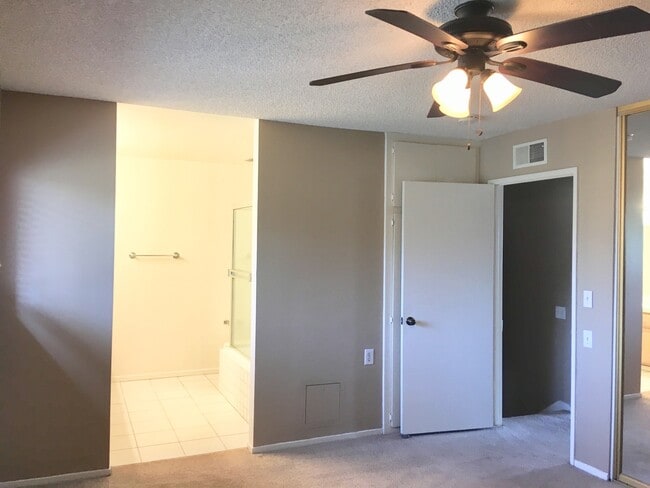 Building Photo - OUTSTANDING 4 BEDROOM HOME IN GATED COMMUNITY