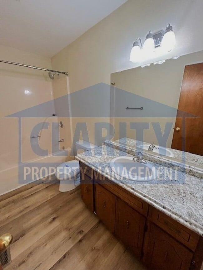 Building Photo - Two bedroom townhome with fenced in backyard!