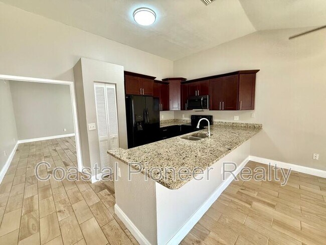 Building Photo - 7048 Hollowell Dr