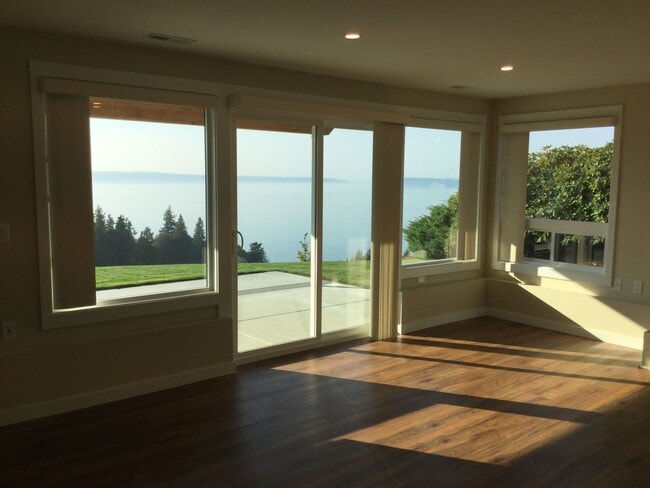 Building Photo - Modern 4-Bedroom Home with Panoramic Water & Mountain Views