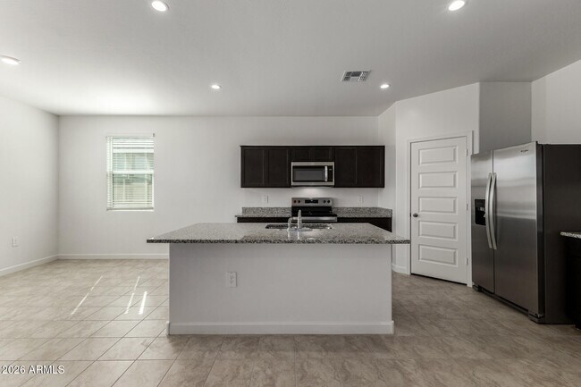 Building Photo - 9173 S Palo Verde Dr