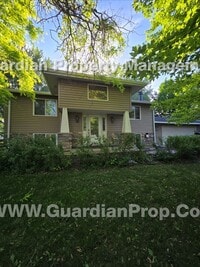 Building Photo - Updated Plymouth Single Family Home, 2 Car Garage, Large fenced Yard, Gas Fireplace