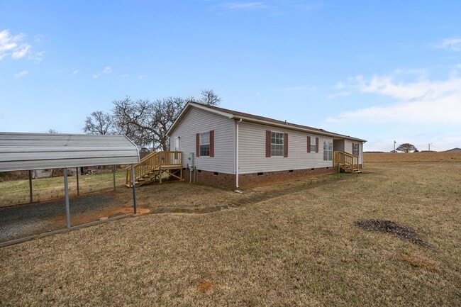 Building Photo - Charming 4-Bedroom Home on Spacious 2.64-Acre Lot in Graham, NC