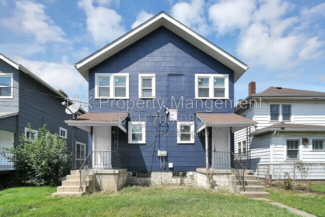 Building Photo - 1311 E 24th Ave