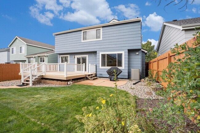 Building Photo - Spacious 4-Bedroom Home in District 20 with Huge Deck & Fenced Yard