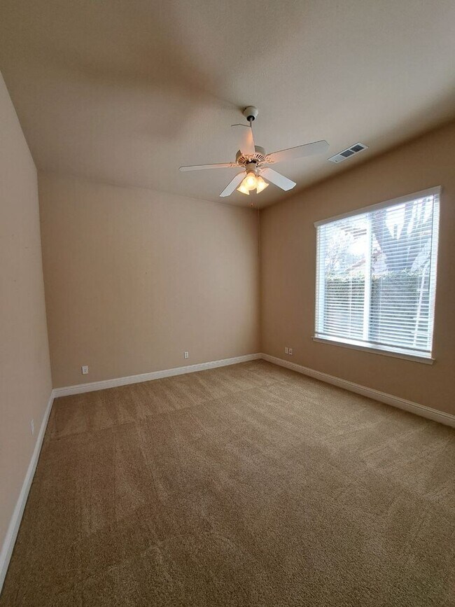 Building Photo - Custom Clovis Residence in Gated Community | Spacious Layout & 3-Car Garage!