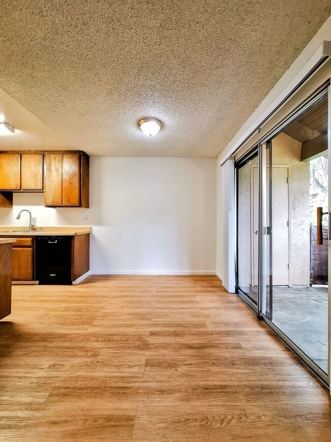 Building Photo - Beautiful 2bd Condo In Gated Community With Pool, Gym, and On-site Laundry