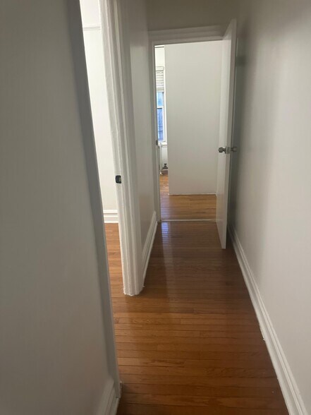 Hallway Left is 2nd BR, Front is 3rd BR - 157 E 40th St