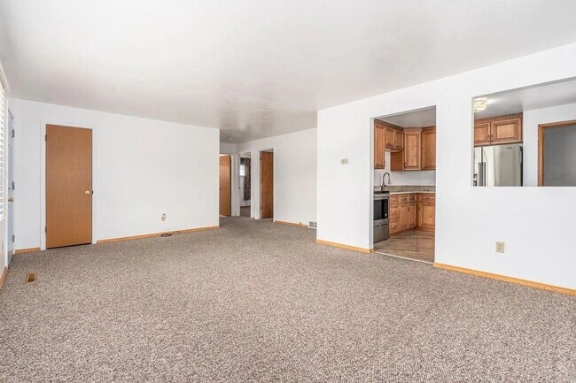 Building Photo - Beautiful 4-Bedroom Home with Finished Bas...