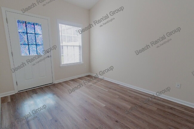 Building Photo - 605 Surfsong Way