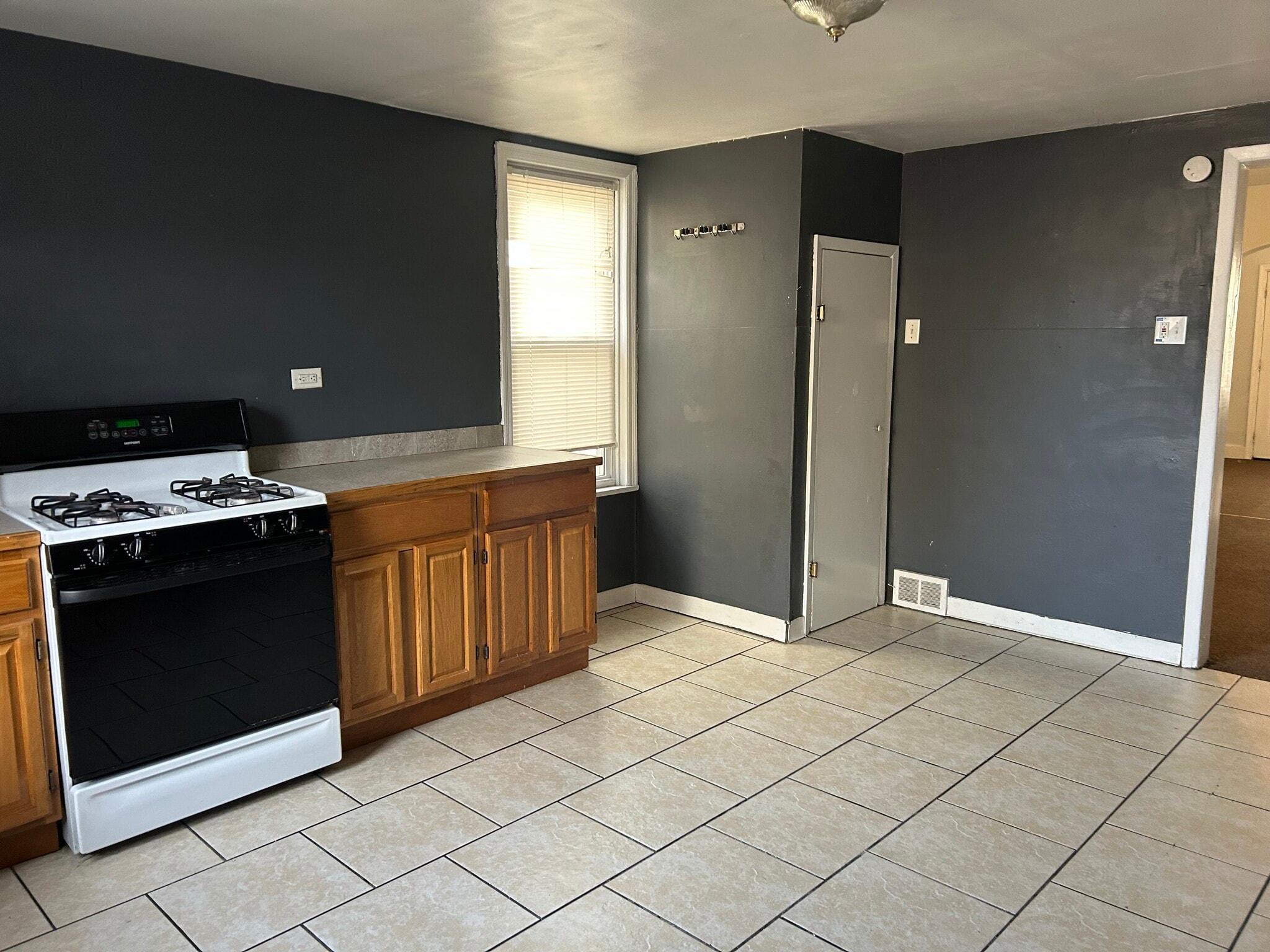 1/2 bath in kitchen - 604 E 5th St