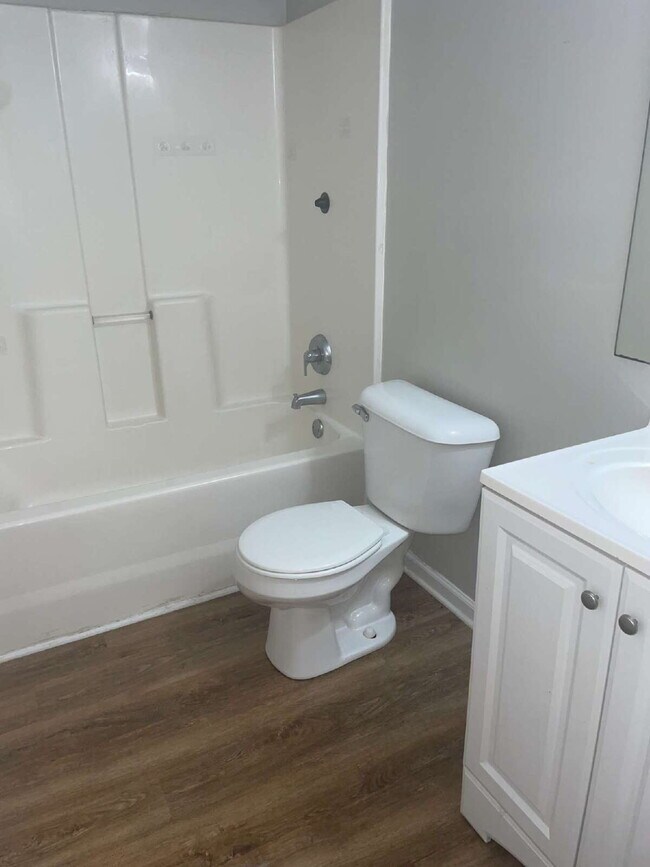 Building Photo - Two Bedroom Two Full Bathroom End Unit Tow...