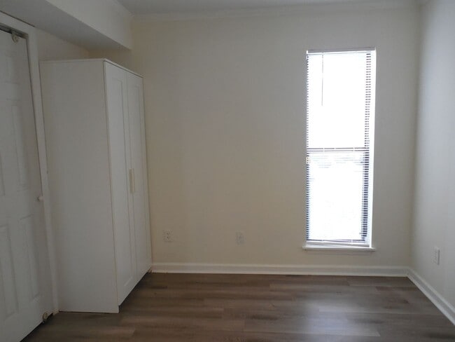 Building Photo - End Unit Condo Available now
