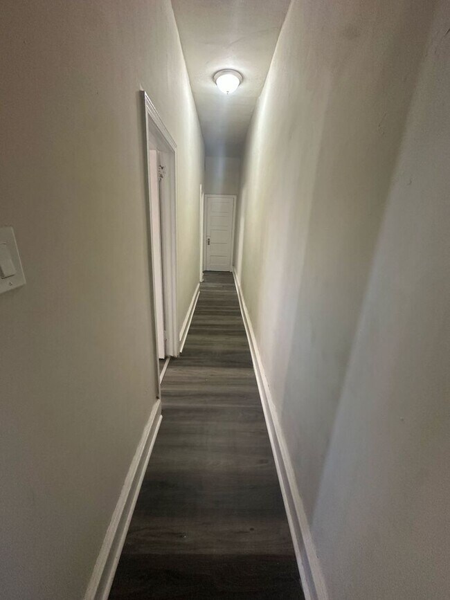 Building Photo - BRAND NEW 2 BEDROOM 1 BATH FIRST FLOOR APARTMENT