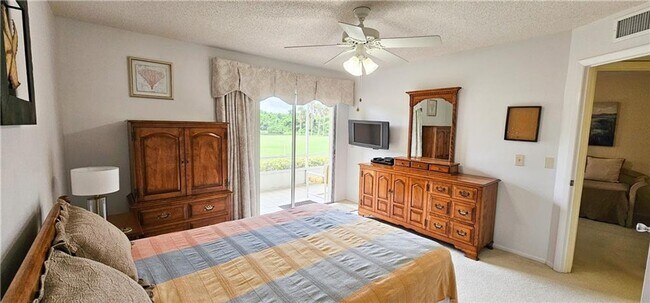 Building Photo - Annual Fully Furnished 2/2 Condo with Golf...