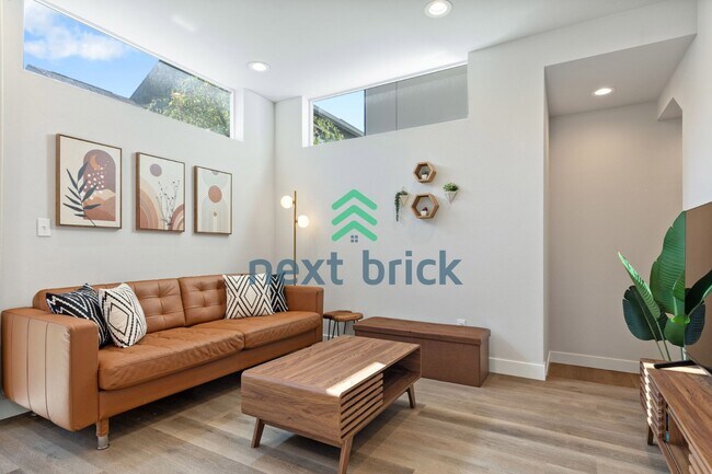 Building Photo - Offer: Unfurnished option available at $3,250, with an optional furnished package for an addition...