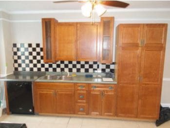 Full-size kitchen with pantry cabinet and like- new appliances, including dishwasher. - 301 S West End Ave