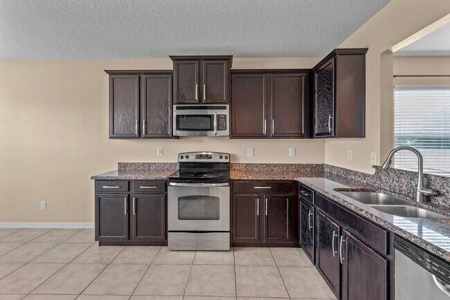 Building Photo - 7806 Tanbier Dr
