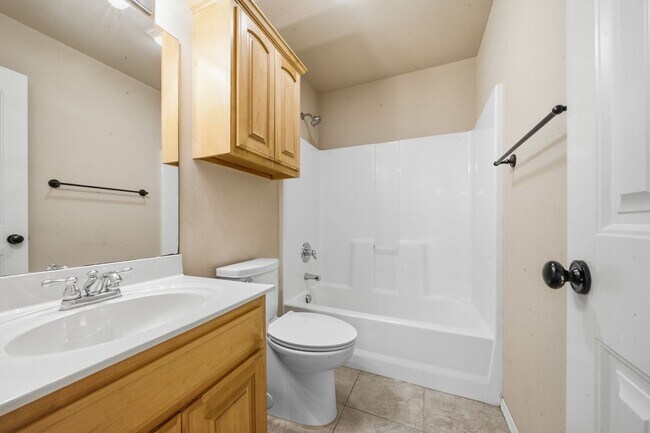 Building Photo - This well-designed home offers 3 bedrooms plus a flex room with a closet that can easily serve as...