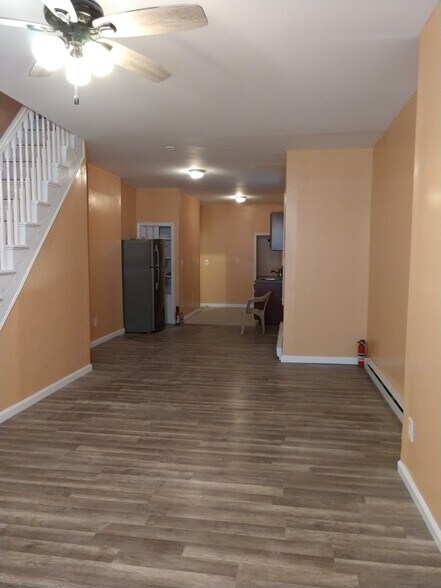 Open floor plan. Living room and kitchen. - 2056 W Boston St