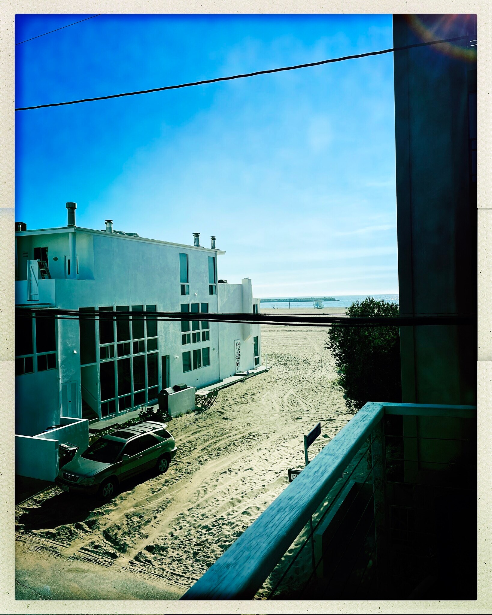 Proximity to beach, photo from front balcony, NOT from rental unit, but from adjacent balcony - 15 Spinnaker St