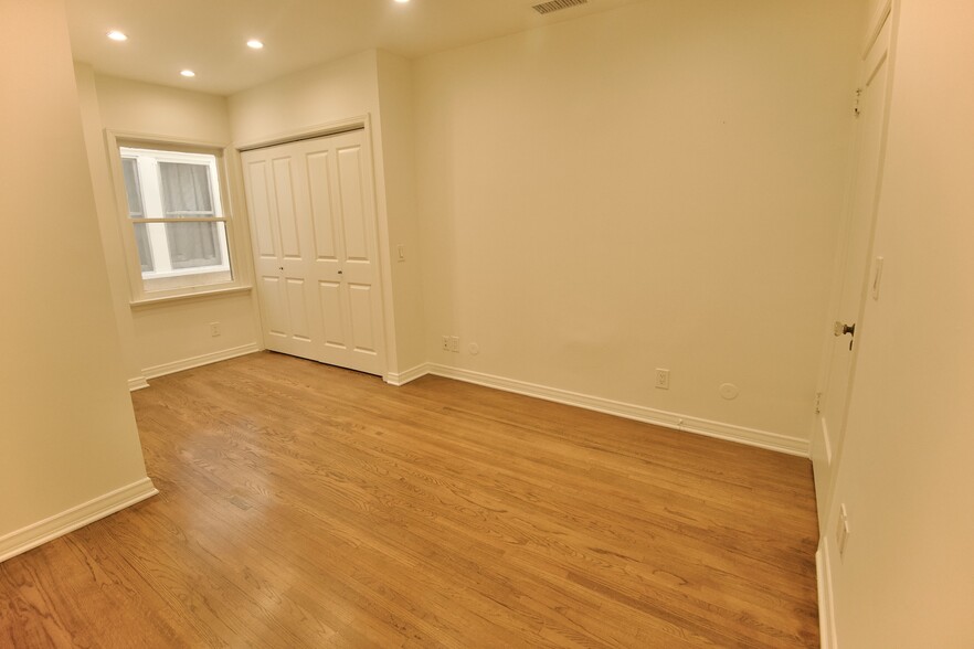 Bedroom 2 from other corner, Natural light and Closet 2 - 4755 Wiota St